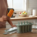 REGENT 6 ICE LOLLY MOULDS IN A SAGE COLOUR PLASTIC HOLDER WITH HANDLE, 230X77MM