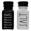 REGENT GLASS BLACK AND WHITE SALT & PEPPER SHAKERS IN A BLACK CADDY