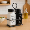 REGENT GLASS BLACK AND WHITE SALT & PEPPER SHAKERS IN A BLACK CADDY