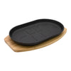 REGENT CAST IRON OVAL STEAK PLATE ON A WOODEN BOARD 275X170XMM