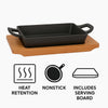 REGENT COOKWARE CAST IRON RECTANGULAR PAN WITH 2 HANDLES ON A WOODEN BOARD, (215X125X65MM)