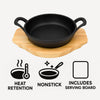 REGENT COOKWARE CAST IRON PAN WITH 2 HANDLES ON A WOODEN BOARD, 180MM DIAX245MM