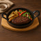REGENT COOKWARE CAST IRON PAN WITH 2 HANDLES ON A WOODEN BOARD, (250X180X79MM)