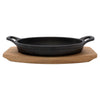 REGENT COOKWARE CAST IRON OVAL PAN WITH 2 HANDLES ON A WOODEN BOARD, 225X120MM