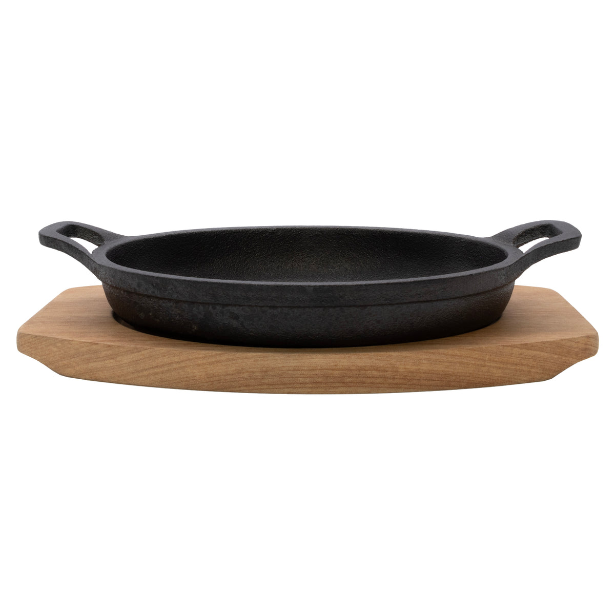 REGENT COOKWARE CAST IRON OVAL PAN WITH 2 HANDLES ON A WOODEN BOARD, 225X120MM