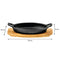 REGENT COOKWARE CAST IRON OVAL PAN WITH 2 HANDLES ON A WOODEN BOARD, (225X120X55MM)