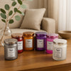 REGENT SCENTED CANDLES (VANILLA) IN EMBOSSED GLASS JARS, ASST. COLOURS 6PK, 185G